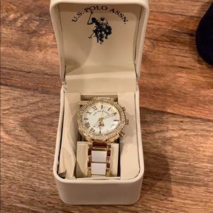 Gold and tan watch